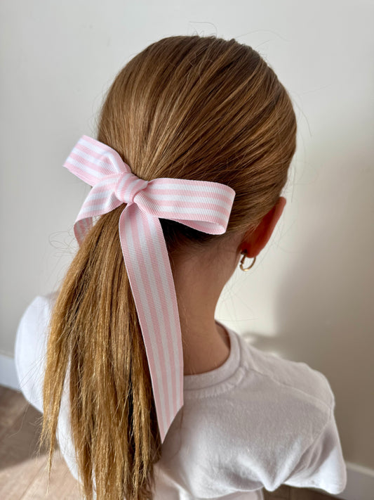 Pink and white stripe long bow