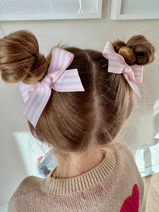 Pink and white stripe pigtails